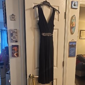Elegant Black Sleeveless Dress with Jewel Detail